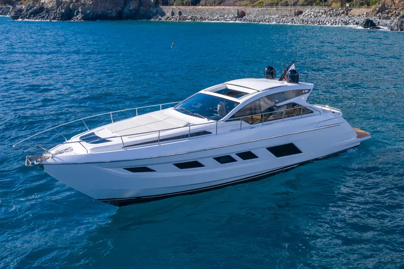 Filippetti S55 Yacht Photos Pics 2025 Filippetti Sport 55 yacht cruising on clear blue water.