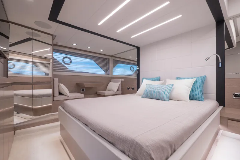 Filippetti S55 Yacht Photos Pics Luxurious bedroom interior of 2025 Filippetti Sport 55 yacht with modern design.