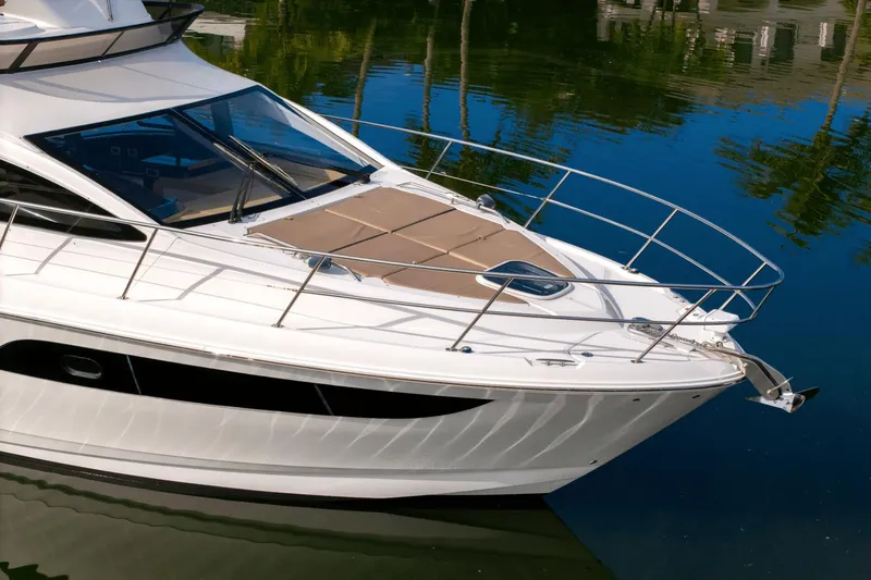 Our Journey Yacht Photos Pics 2017 Sea Ray 400 Fly yacht on calm water, showcasing sleek design and luxury features.