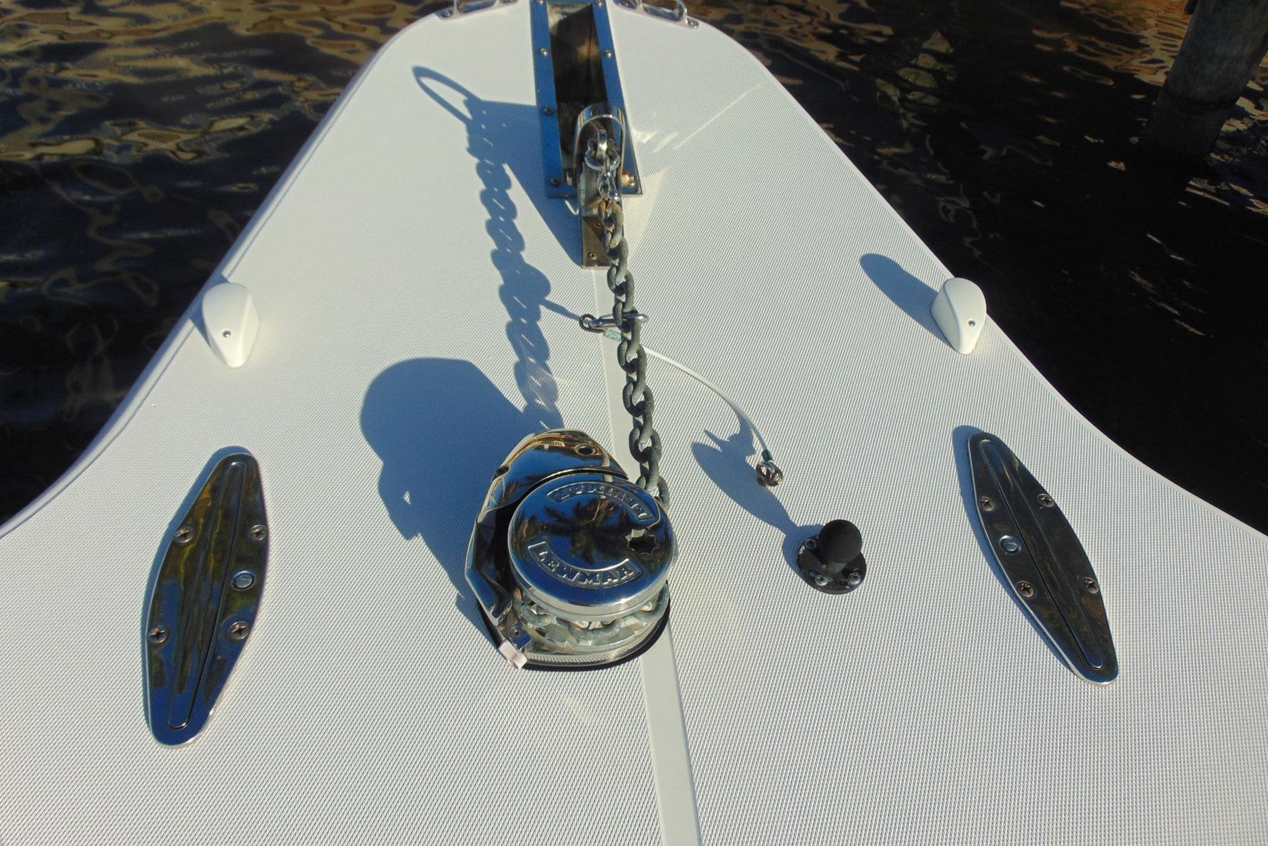 Bow of 2019 Stamas 390 Tarpon with anchor chain and winch.