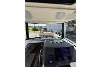Interior view of 2021 Nimbus C8 boat cockpit with navigation controls.