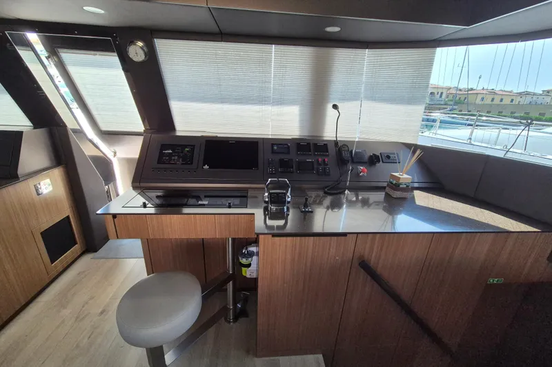 Alemys Yacht Photos Pics Luxurious helm station of 2023 Sunreef 50 yacht with modern navigation equipment.