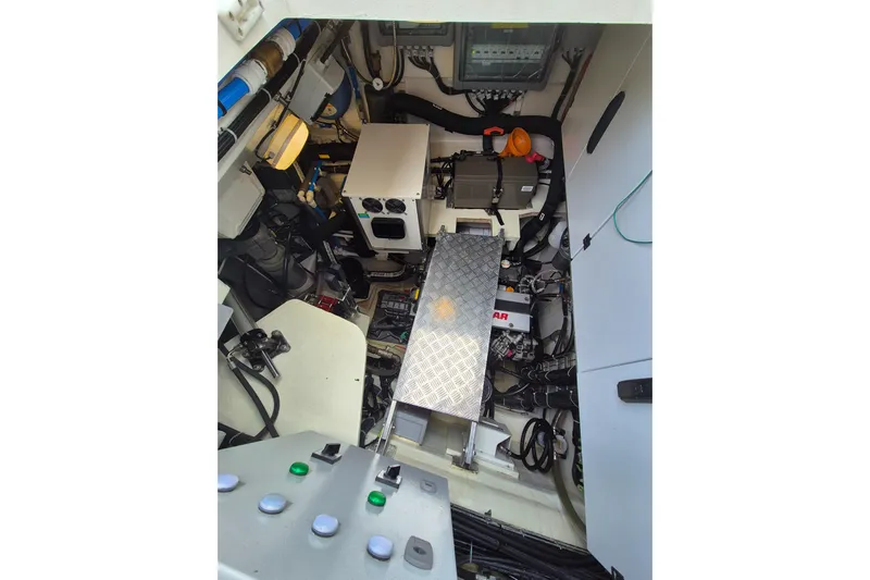 Alemys Yacht Photos Pics Engine room of 2023 Sunreef 50 yacht, showcasing mechanical components and control panels.