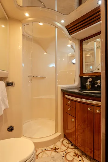  Yacht Photos Pics Luxurious bathroom in 2003 Sea Ray 680 Sun Sport yacht with elegant wood cabinetry.