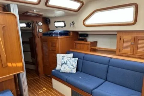 Sapphire Seas Yacht Photos Pics Interior of a 2005 Island Packet 445 yacht with blue upholstery.