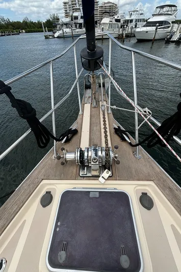 Sapphire Seas Yacht Photos Pics Foredeck of a 2005 Island Packet 445 sailboat in harbor.