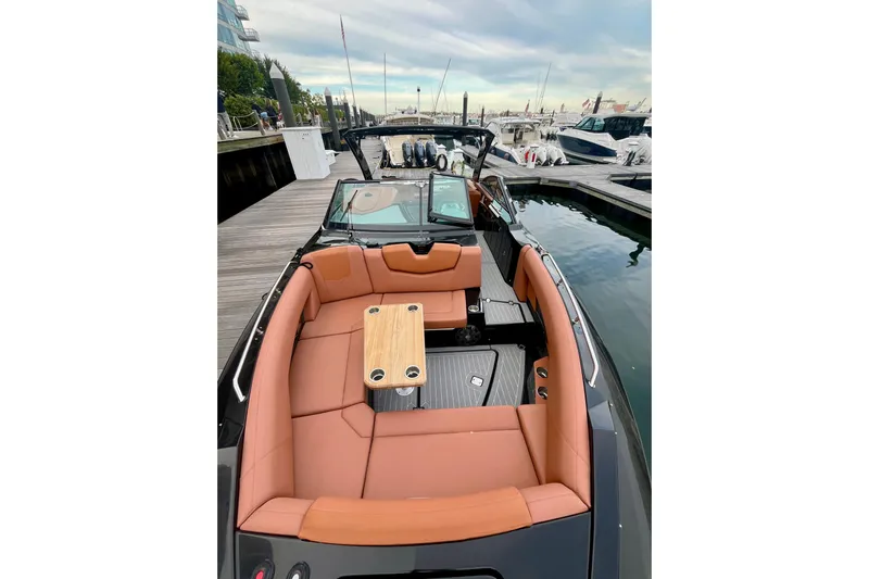  Yacht Photos Pics 2022 Cruisers Yachts 338 South Beach Edition Bow Rider with luxurious seating and table.