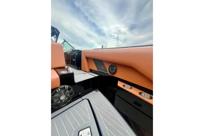  Yacht Photos Pics 2022 Cruisers Yachts 338 South Beach Edition Bow Rider interior with sleek design and cup holders.