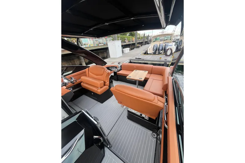  Yacht Photos Pics 2022 Cruisers Yachts 338 South Beach Edition Bow Rider with luxurious seating and sleek design.