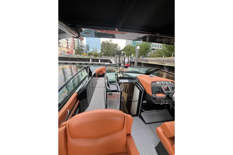  Yacht Photos Pics 2022 Cruisers Yachts 338 South Beach Edition Bow Rider interior with luxurious seating.