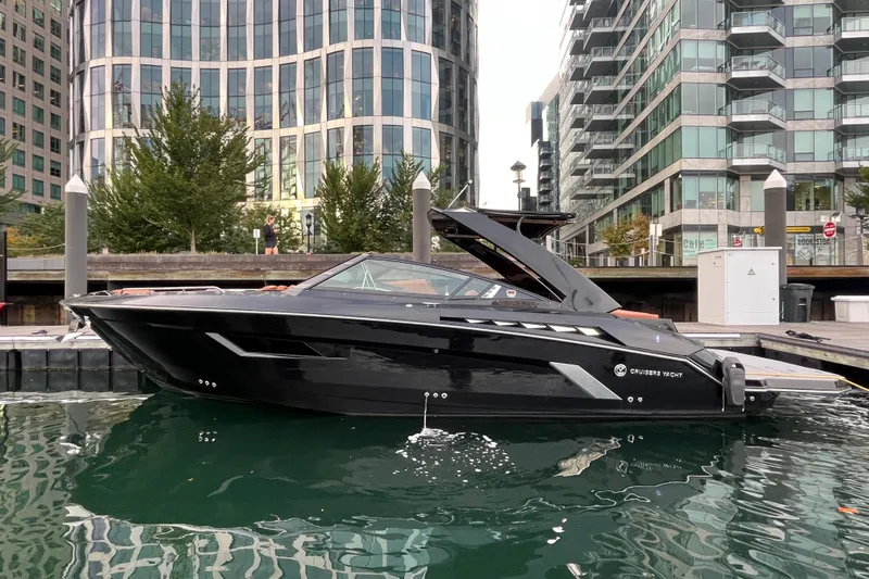  Yacht Photos Pics 2022 Cruisers Yachts 338 South Beach Edition Bow Rider docked in urban marina.