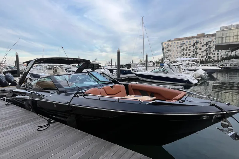  Yacht Photos Pics 2022 Cruisers Yachts 338 South Beach Edition Bow Rider docked at marina.