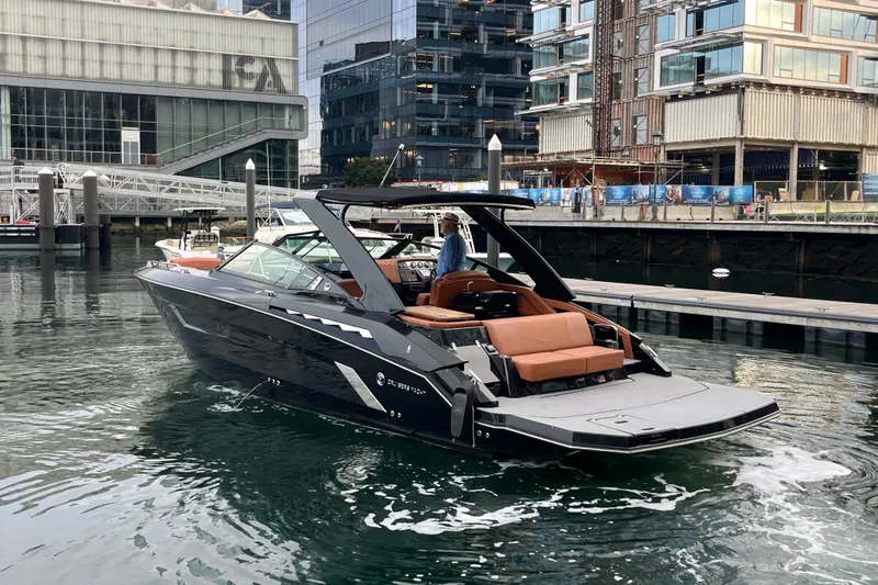  Yacht Photos Pics 2022 Cruisers Yachts 338 South Beach Edition Bow Rider in urban marina setting.