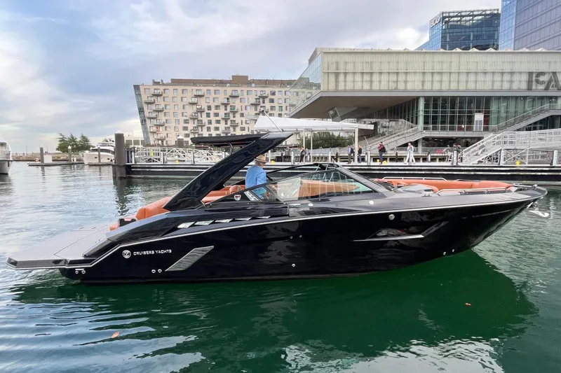  Yacht Photos Pics 2022 Cruisers Yachts 338 South Beach Edition Bow Rider docked in urban marina.