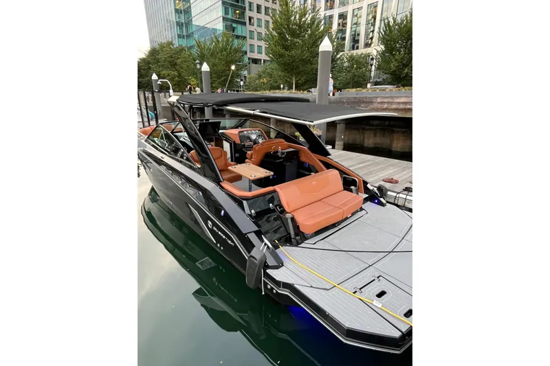  Yacht Photos Pics 2022 Cruisers Yachts 338 South Beach Edition Bow Rider docked, featuring sleek design and luxury seating.