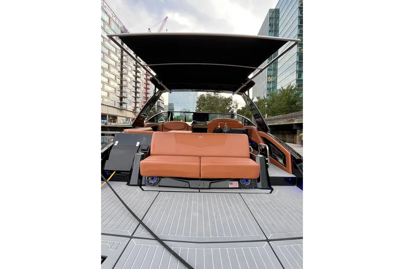  Yacht Photos Pics 2022 Cruisers Yachts 338 South Beach Edition Bow Rider with sleek design and luxurious seating.