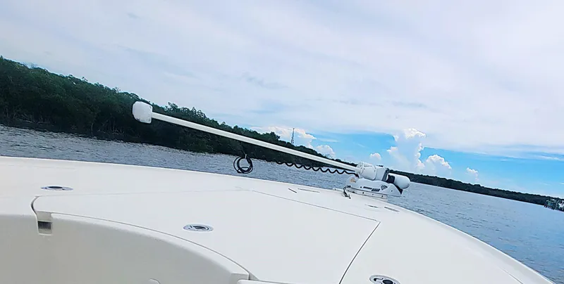  Yacht Photos Pics 2017 SeaVee 270Z boat on calm water under a partly cloudy sky.