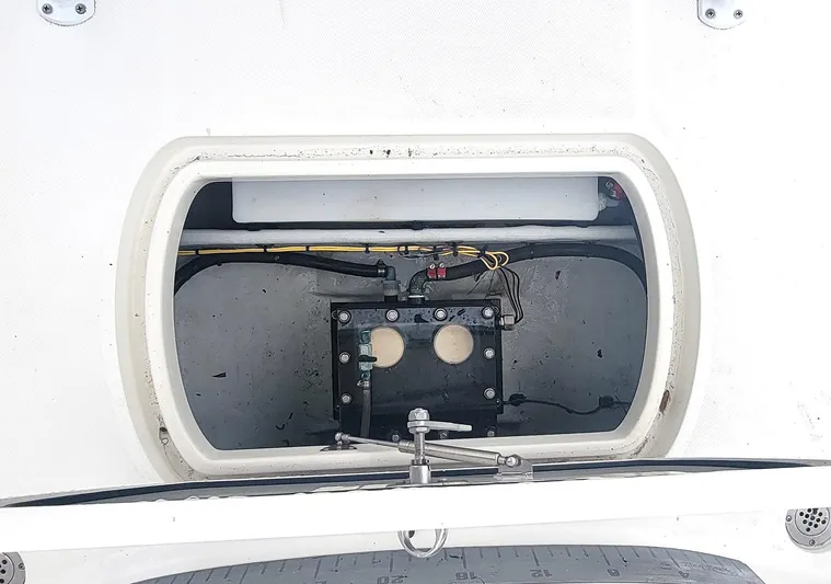  Yacht Photos Pics 2017 SeaVee 270Z boat storage compartment with wiring and components visible.