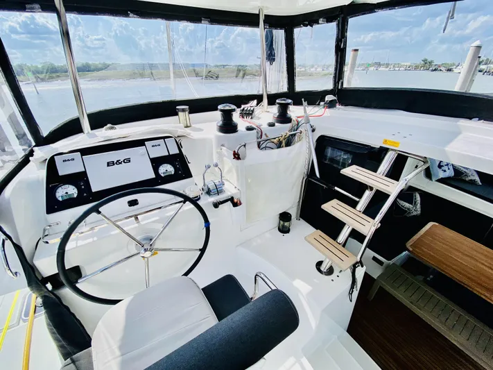 No Schedule Yacht Photos Pics Helm of 2019 Lagoon 42 Owners Version catamaran with B&G navigation system and seating.
