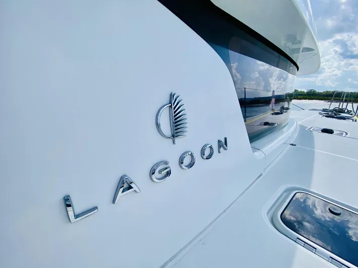 No Schedule Yacht Photos Pics 2019 Lagoon 42 Owners Version yacht with sleek design and logo detail.