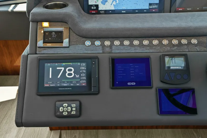 Gia Yacht Photos Pics Dashboard of 2021 Riviera 5400 Sport Yacht with navigation and control displays.