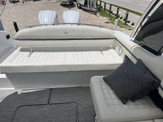  Yacht Photos Pics Luxury seating on 2022 Cobalt 30SC boat with cushioned seats and pillow.