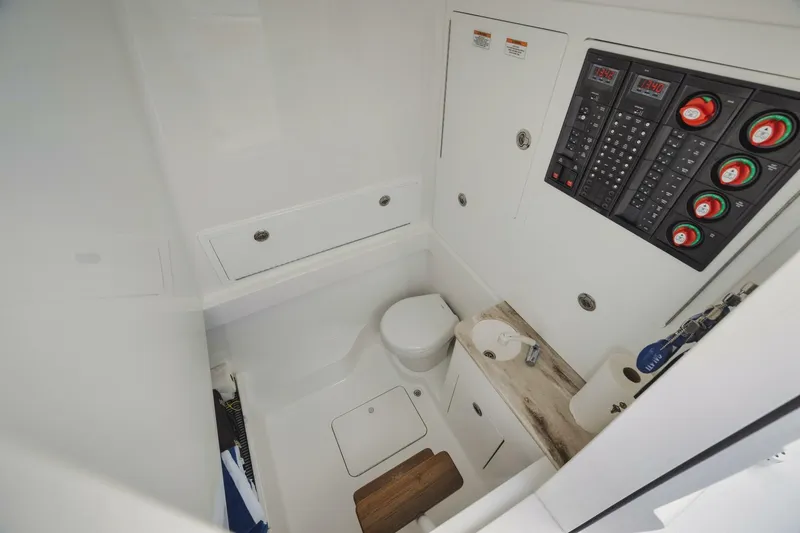 Primo Yacht Photos Pics 2023 Valhalla Boatworks V-41 interior cabin with toilet and control panel.