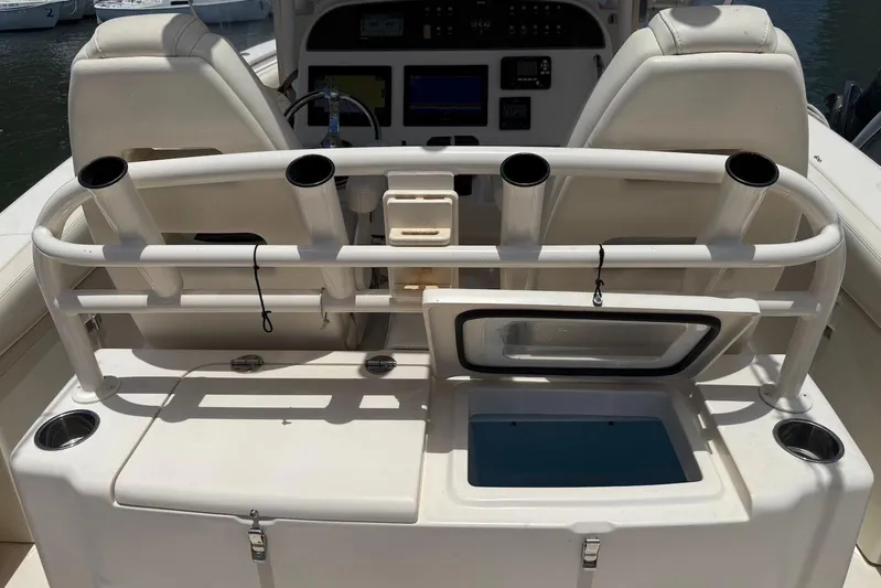  Yacht Photos Pics 2020 Grady-White Canyon 306 boat interior with rod holders and storage compartments.