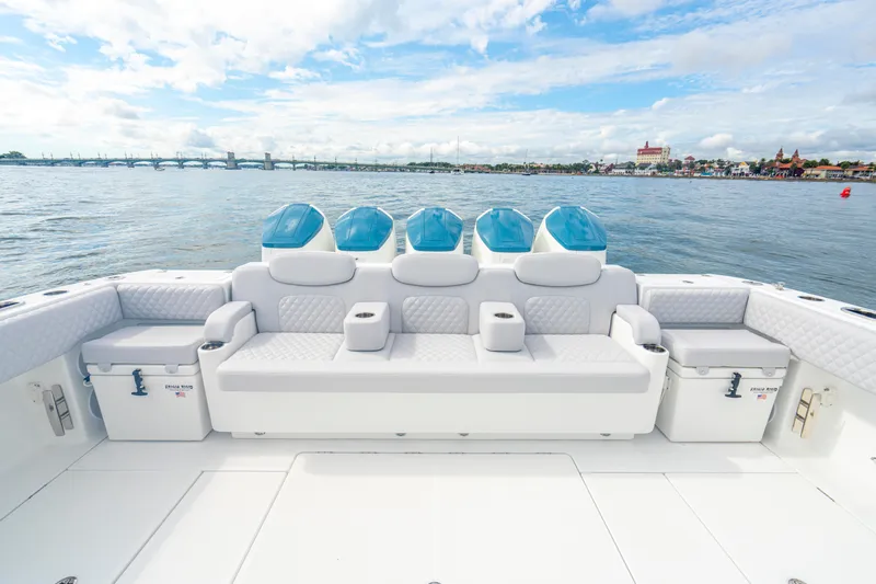  Yacht Photos Pics Luxury seating on 2026 HCB 56 Suenos GIX boat with scenic waterfront view.