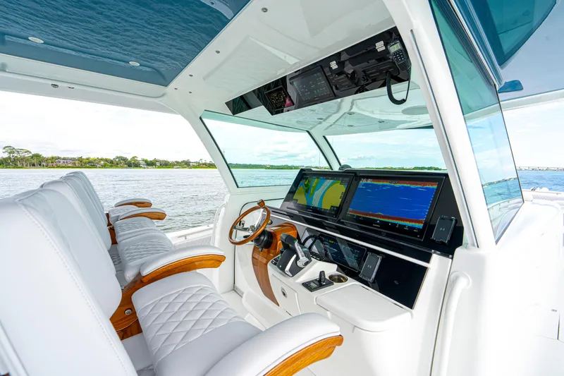  Yacht Photos Pics Luxurious helm of 2026 HCB 56 Suenos GIX yacht with advanced navigation displays.