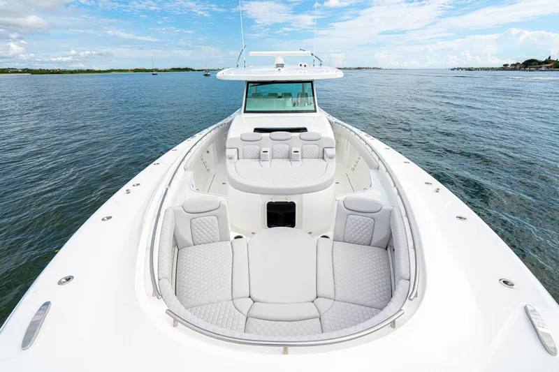  Yacht Photos Pics Luxurious 2026 HCB 56 Suenos GIX yacht with spacious seating on open water.