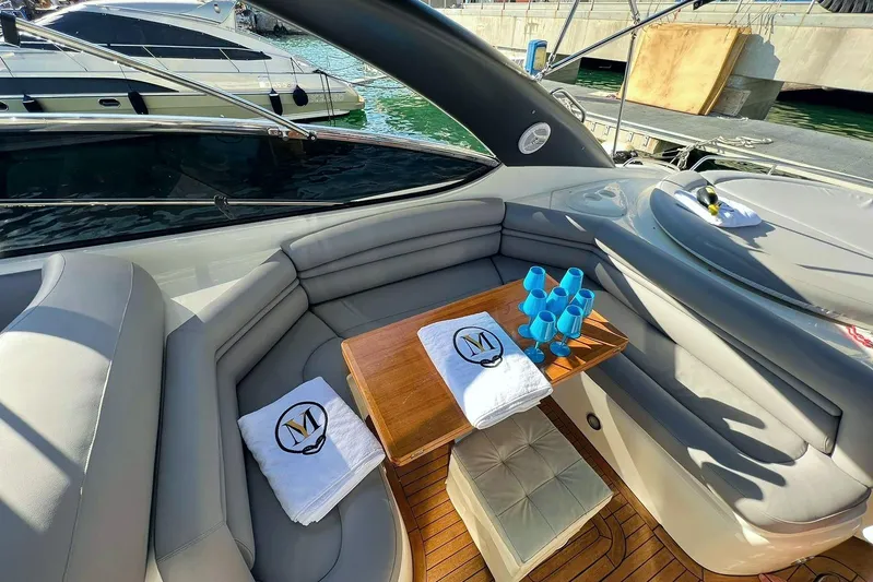  Yacht Photos Pics Luxurious Sunseeker Predator 58 yacht interior with elegant seating and table, 2000 model.