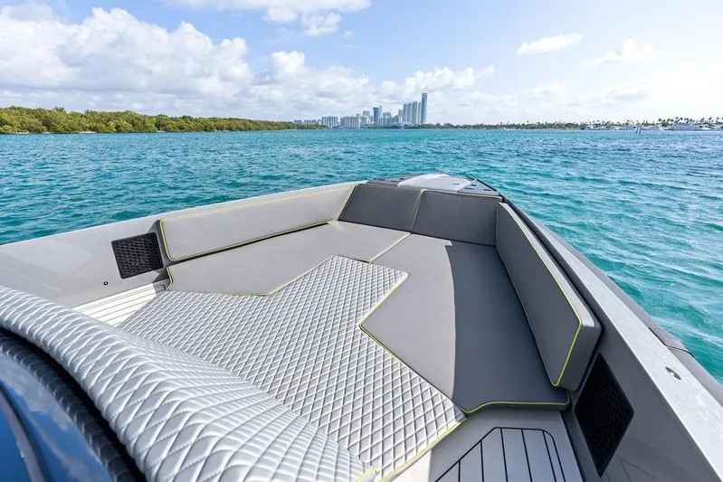 Mako Yacht Photos Pics Luxurious 2024 Maori M46 boat interior with city skyline and ocean view.