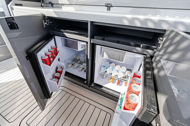 Mako Yacht Photos Pics Dual mini fridges on Maori M46 yacht, stocked with beverages, 2024 model.