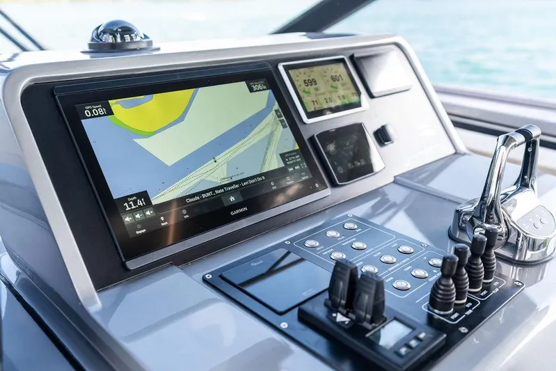 Mako Yacht Photos Pics 2024 Maori M46 yacht dashboard with navigation screens and controls.