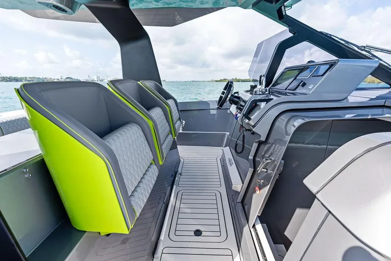 Mako Yacht Photos Pics 2024 Maori M46 boat interior with modern cockpit and vibrant green seating.