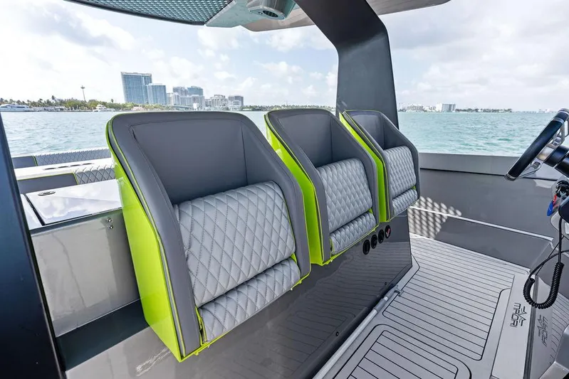 Mako Yacht Photos Pics Luxurious seating on 2024 Maori M46 boat with quilted design and vibrant accents.