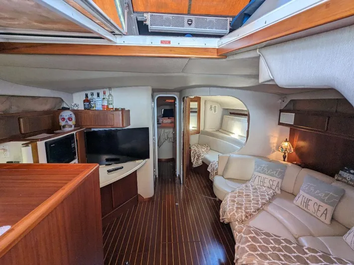 Irrational Exuberance Yacht Photos Pics Luxurious interior of a 1994 Sea Ray 400 Express yacht with modern amenities.