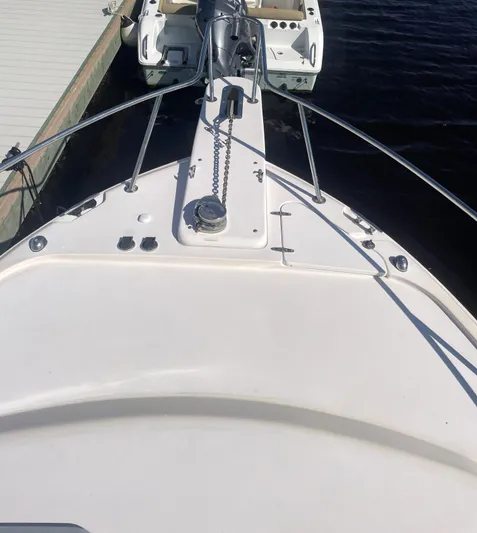 Working Girl Yacht Photos Pics 2008 Grady-White Open Express boat docked at marina.