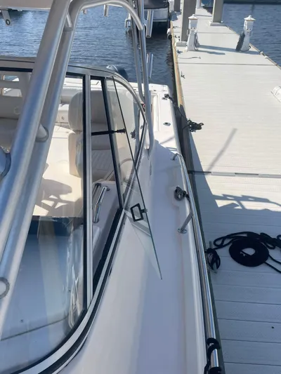 Working Girl Yacht Photos Pics 2008 Grady-White Open Express boat docked at marina.