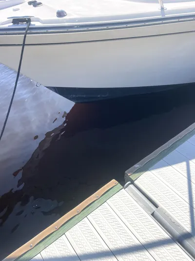 Working Girl Yacht Photos Pics 2008 Grady-White Open Express boat docked at marina.