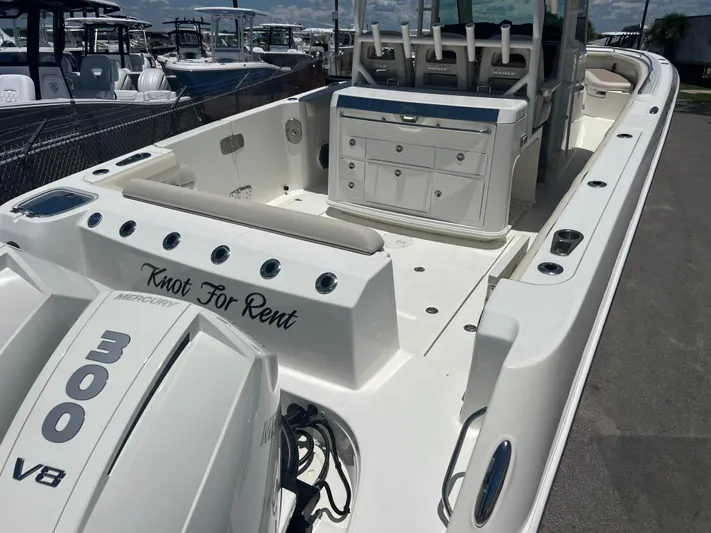  Yacht Photos Pics 2017 Boston Whaler 350 Outrage boat with Mercury 300 V8 engine, docked at marina.