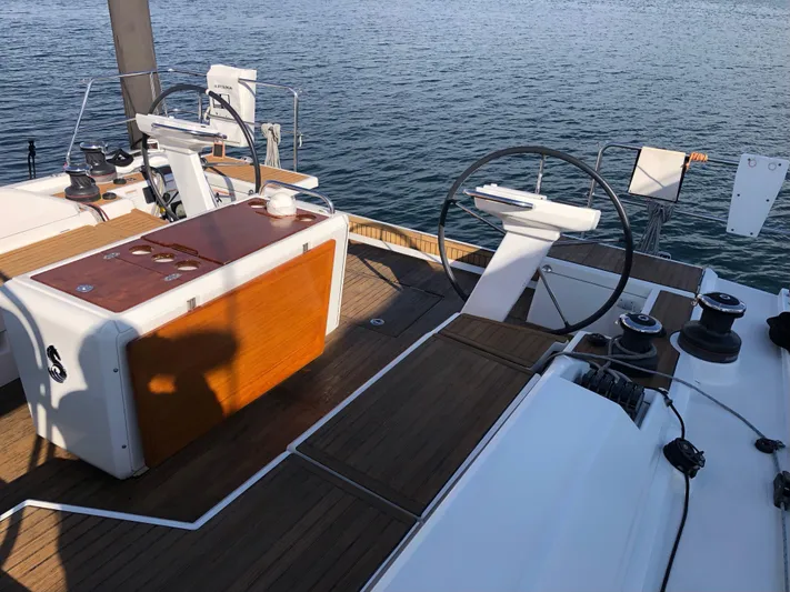 Hydrobaby3 Yacht Photos Pics 2019 Beneteau Oceanis 51.1 yacht deck with dual steering wheels and teak finish.