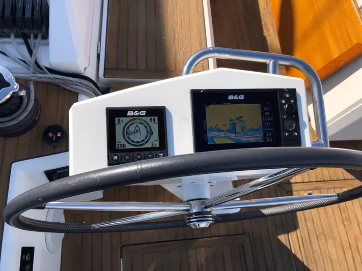 Hydrobaby3 Yacht Photos Pics Steering wheel and navigation instruments on a 2019 Beneteau Oceanis 51.1 yacht.