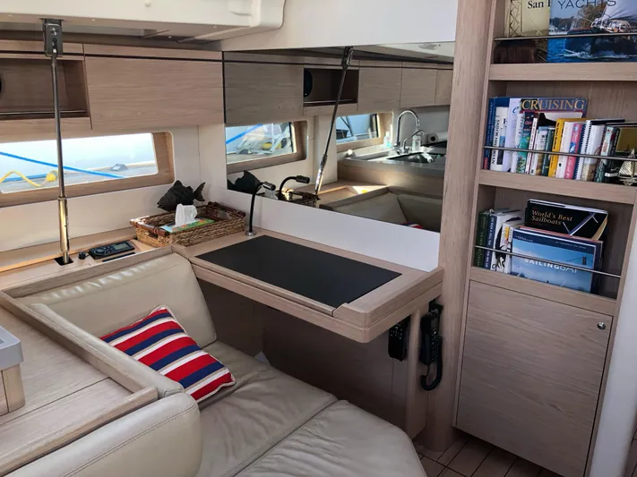 Hydrobaby3 Yacht Photos Pics Interior of 2019 Beneteau Oceanis 51.1 yacht with modern design and cozy seating area.