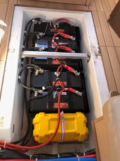 Hydrobaby3 Yacht Photos Pics Battery compartment of 2019 Beneteau Oceanis 51.1 sailboat with wiring and connections.