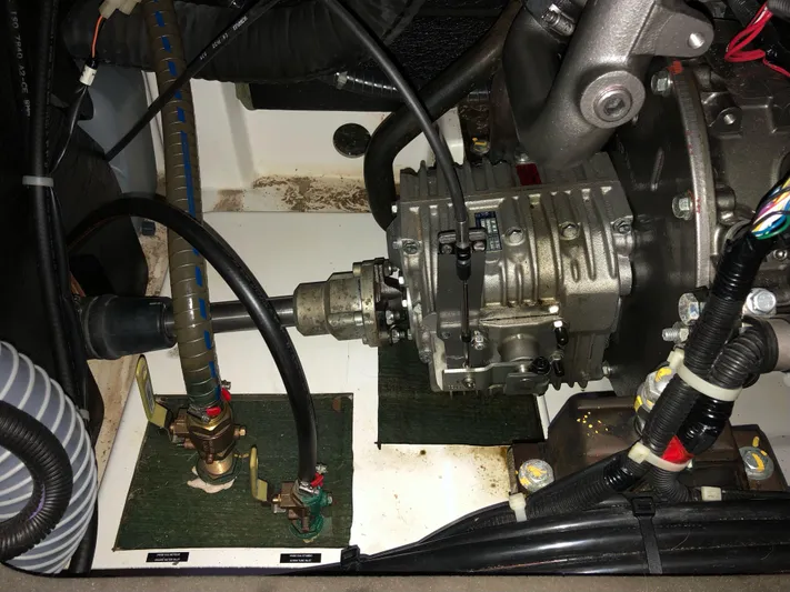 Hydrobaby3 Yacht Photos Pics Engine compartment of a 2019 Beneteau Oceanis 51.1 sailboat, showcasing mechanical components.