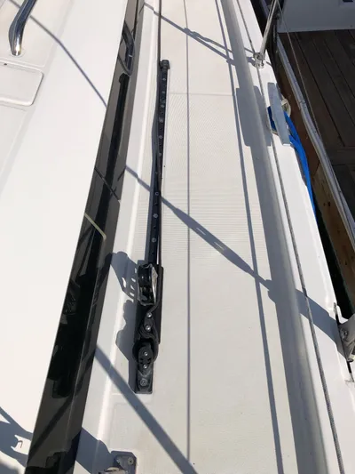 Hydrobaby3 Yacht Photos Pics 2019 Beneteau Oceanis 51.1 deck with rail system, showcasing sleek design and functionality.
