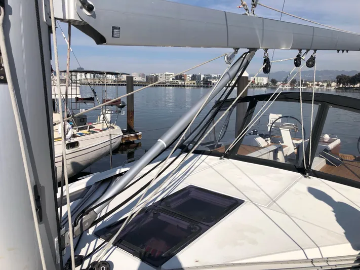 Hydrobaby3 Yacht Photos Pics 2019 Beneteau Oceanis 51.1 sailboat docked in a marina, showcasing deck and rigging.