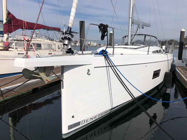 Hydrobaby3 Yacht Photos Pics 2019 Beneteau Oceanis 51.1 yacht docked at marina, sleek white design.